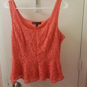 Coral lace sleeveless peplum top